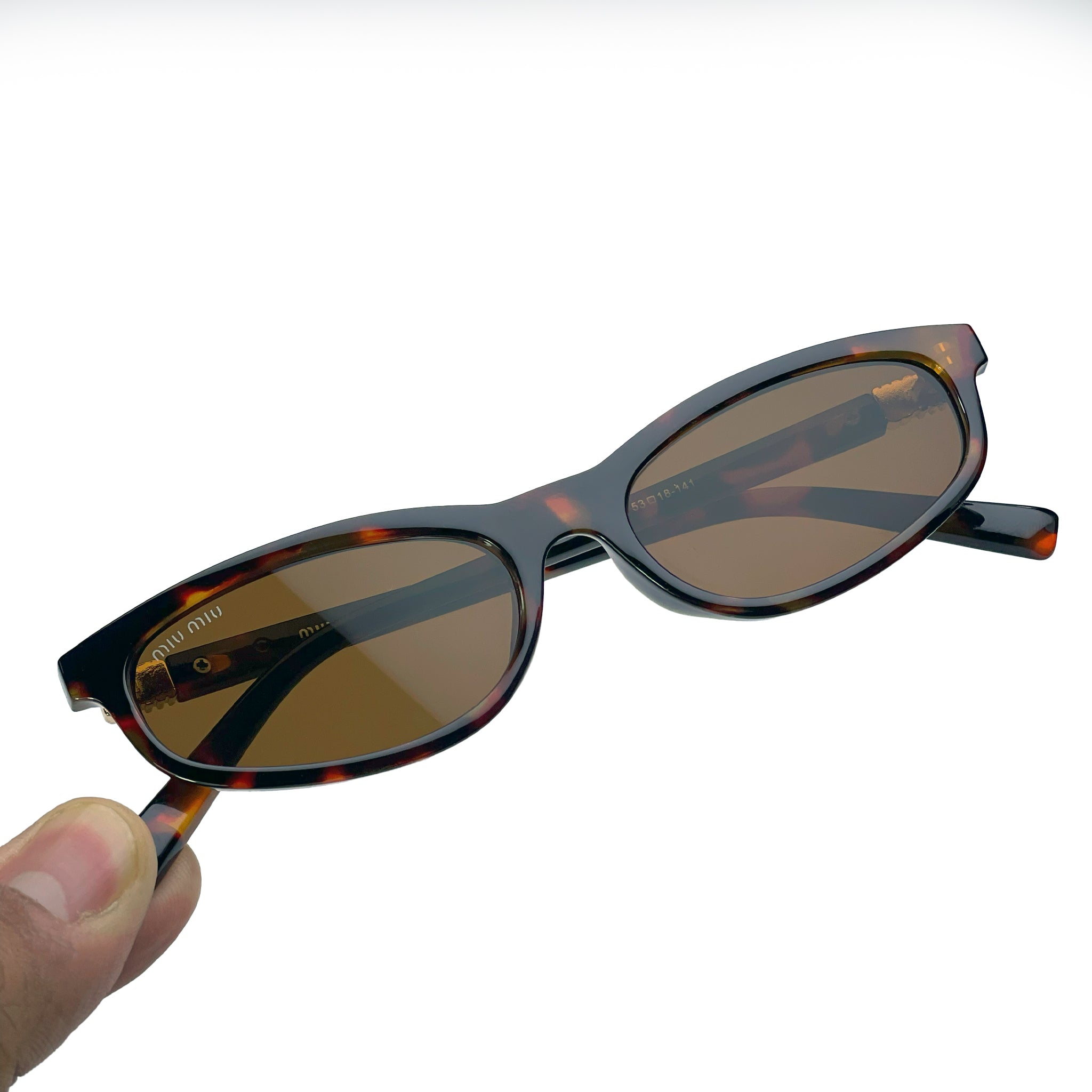 Miu Miu MU1